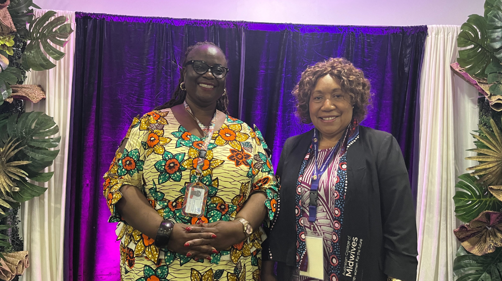 UNFPA Sexual and Reproductive Health Technical Specialist with PNG Midwifery Society President Sr. Mary Sitaing during the Bi-annual Symposium.