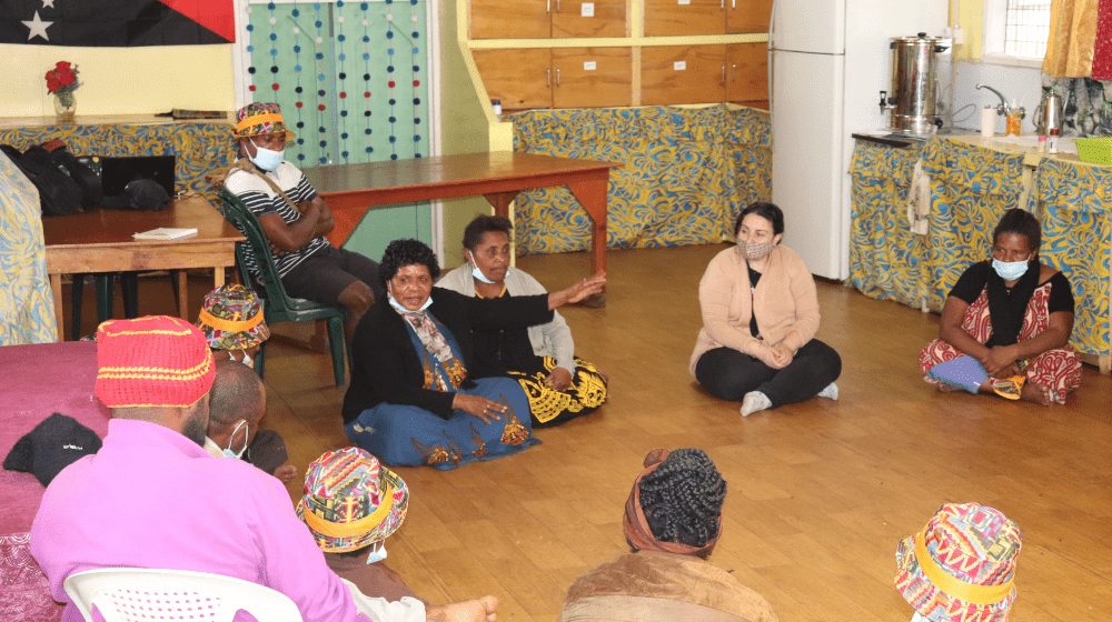 Community Leader Ms. Alice Bibe talking during a session on Psychological